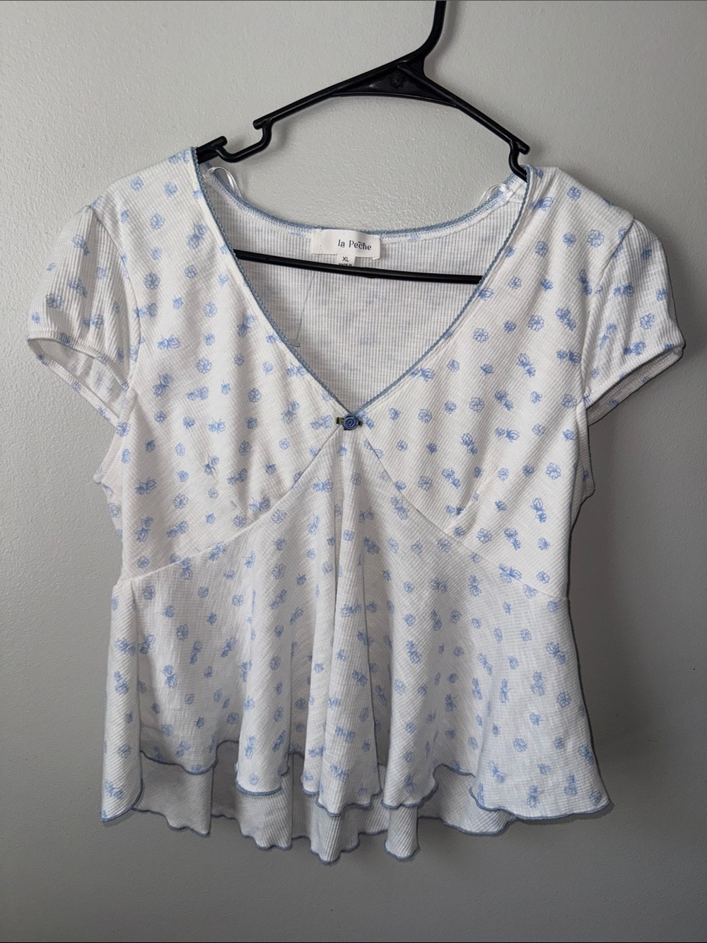 La Peche white and blue floral peplum top